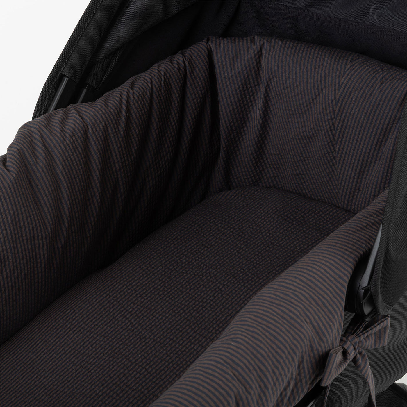 Capa Bugaboo riscas caramelo